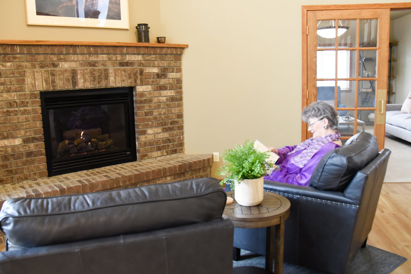 assisted living fireplace with senior